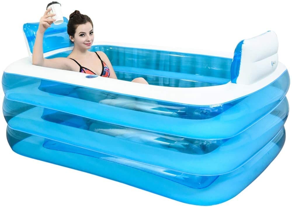 A blue foldable portable bathtub filled with water
