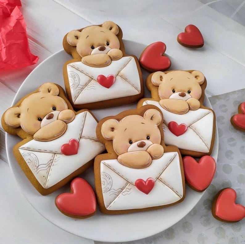 Perfectly baked sugar cookie cutouts A beautiful plate of decorated holiday sugar cookie cutouts