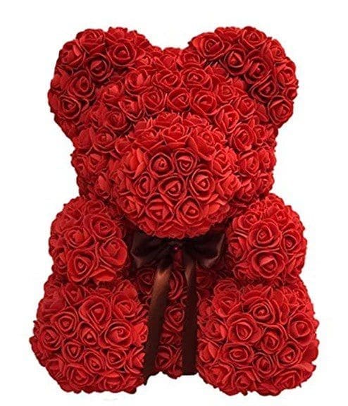 Flower Bear Gift Guide Pink flower bear made from artificial roses displayed in a clear gift box
