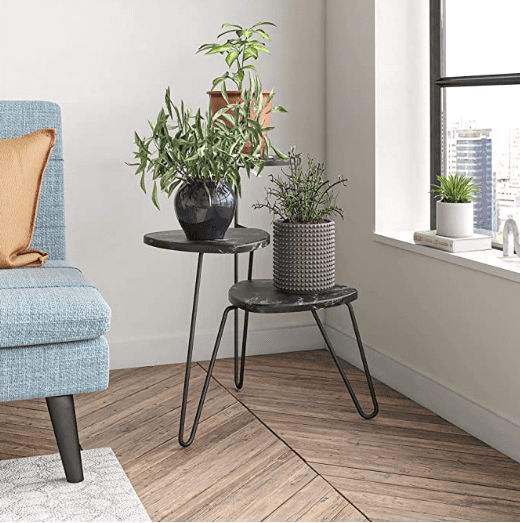 Amazon sells the Novogratz Athena Black or White Marble Plant Stand Amazon sells the Novogratz Athena Black or White Marble Plant Stand