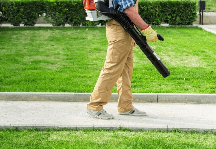 Greenworks Leaf Blowers A collection of green and black Greenworks Leaf Blowers for yard maintenance