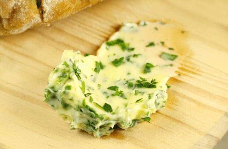 Garlic Butter On Wooden Butter Board Garlic Butter On Wooden Butter Board