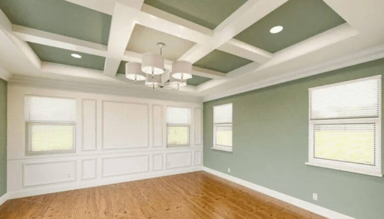 Coffered Ceilings in a Finished Living Room Elegant white coffered ceiling with recessed panels in a finished living room