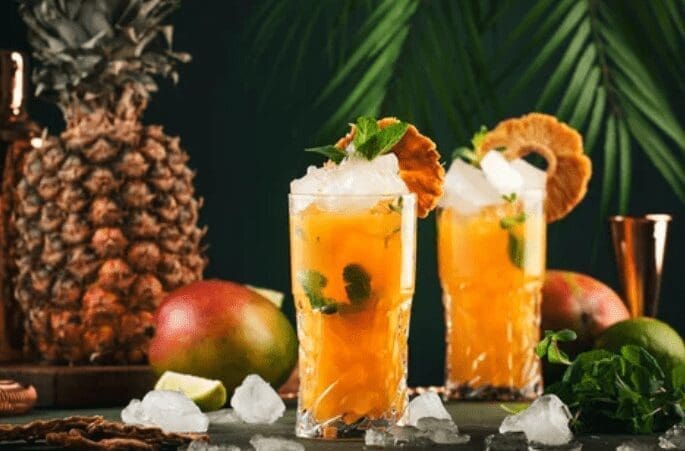 Mango Pineapple Ice Mango pineapple flavored ice served as a tropical frozen dessert